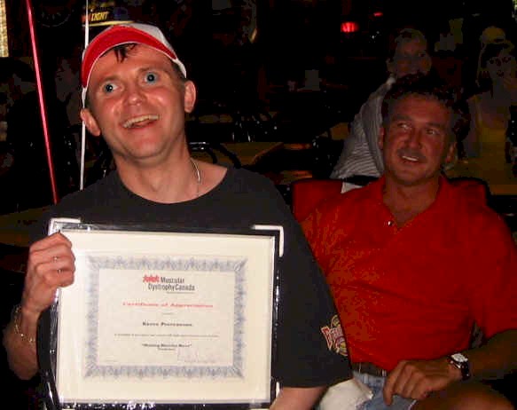 ROCCO WITH AWARD_edited.jpg (75753 bytes)